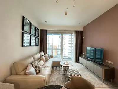 Modern living room with stylish decor and city view from large windows