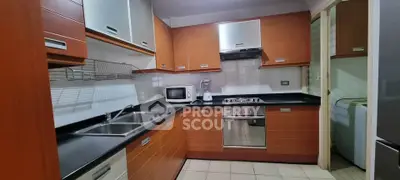 Modern kitchen with sleek cabinetry and stainless steel appliances