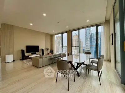 Luxurious modern living room with stunning city view and elegant dining area.