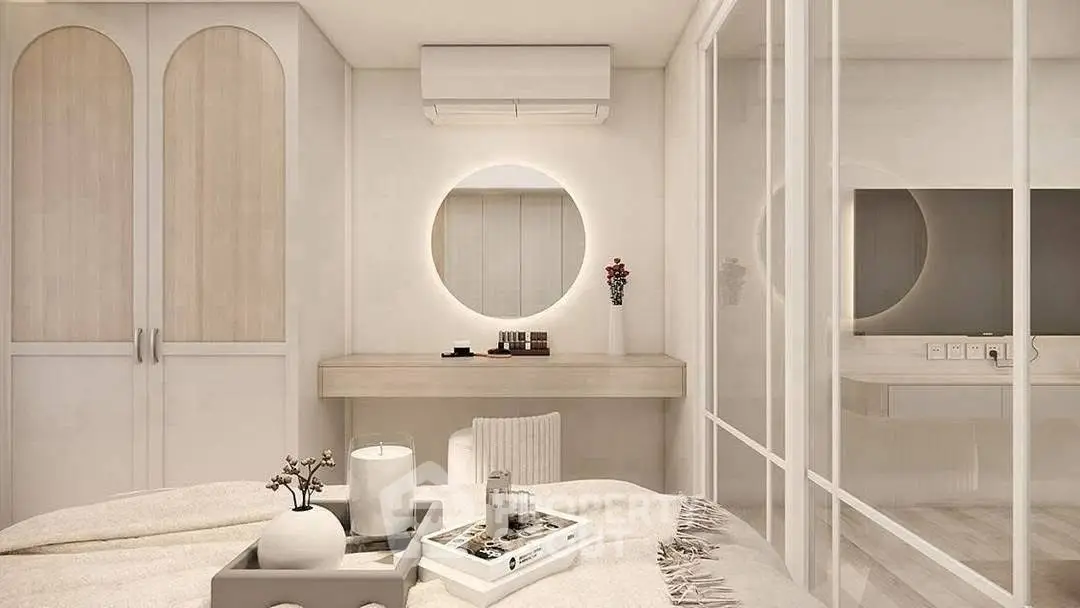 Elegant bedroom with modern decor and stylish vanity mirror