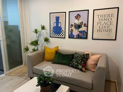 Chic living room with modern decor and cozy sofa, perfect for relaxation and style.