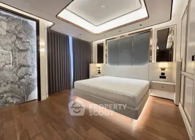 Luxurious modern bedroom with elegant lighting and stylish decor