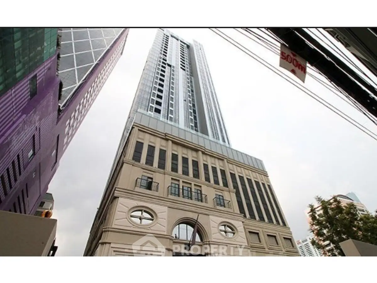 Stunning high-rise building with modern architecture in urban setting.