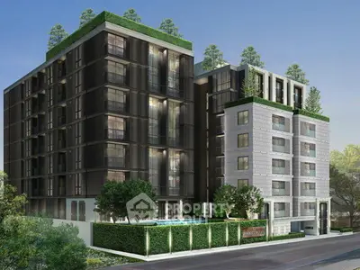 Modern luxury apartment building with lush greenery and sleek design.
