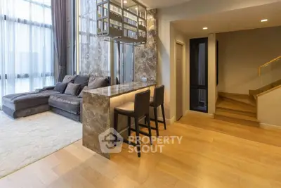 Luxurious modern living room with elegant bar and cozy seating area