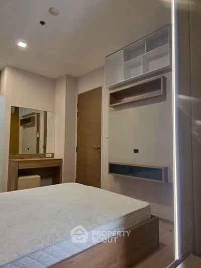 Modern bedroom with built-in storage and minimalist design