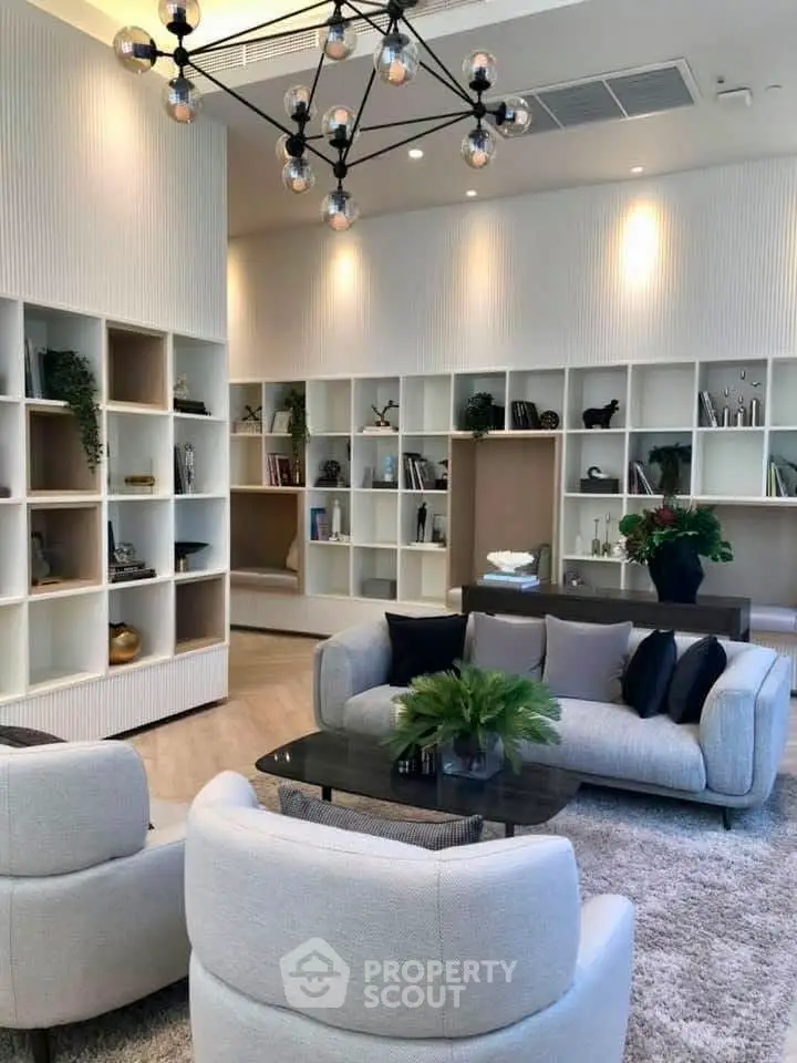 Luxurious modern living room with elegant furniture and stylish decor, perfect for relaxation and entertainment.