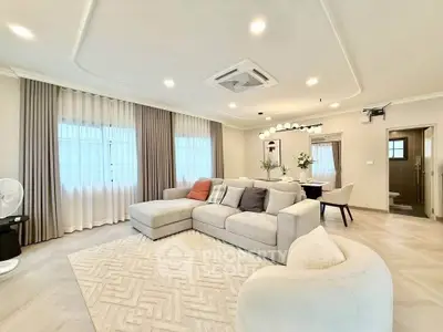 Spacious modern living room with elegant decor and cozy seating area