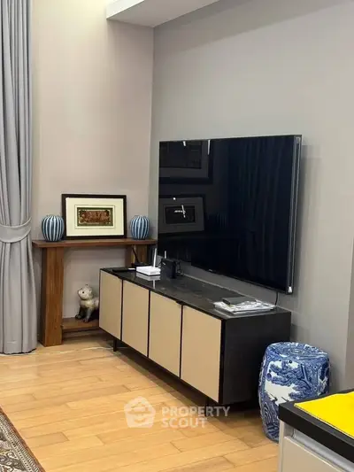 Modern living room with sleek TV setup and stylish decor