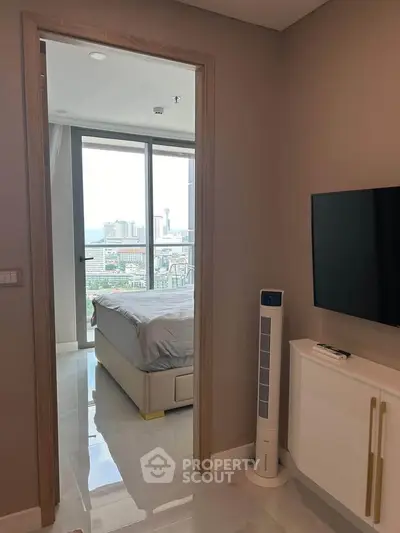 Modern bedroom with city view and sleek interior design
