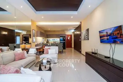 Luxurious modern living room with open kitchen and stylish decor