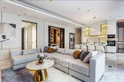 Luxurious open-plan living room with modern kitchen and elegant decor