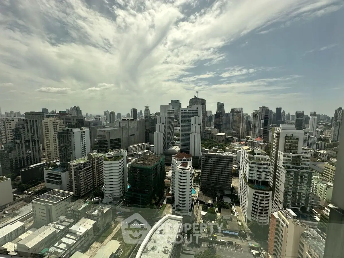 Stunning cityscape view from high-rise building showcasing urban skyline and architecture.