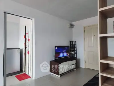Cozy living room with modern TV setup and stylish decor