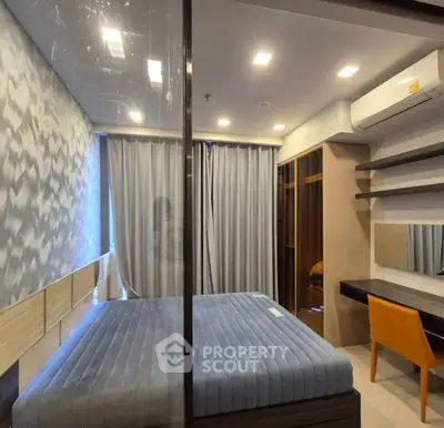 Modern bedroom with stylish decor and ample storage space