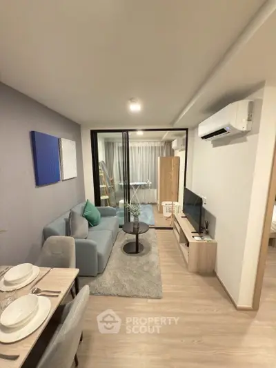 Modern living room with stylish decor and open layout in a contemporary apartment.