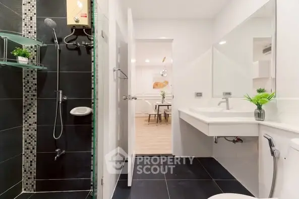 Modern bathroom with sleek design and spacious shower area