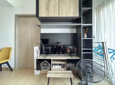 Modern living room with sleek TV stand and stylish shelving