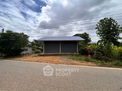 Charming rural property with potential, featuring a spacious lot and serene surroundings.