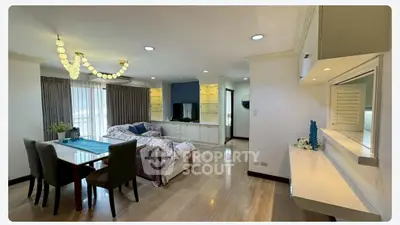 Spacious living room with elegant decor and natural light in modern apartment