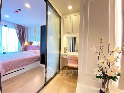Modern bedroom with elegant decor and sliding glass wardrobe doors