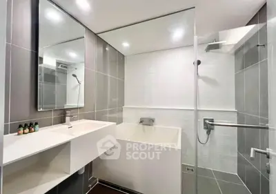 Modern bathroom with sleek design and glass shower enclosure