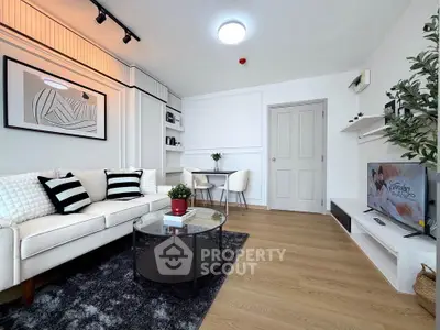 Modern living room with stylish decor and cozy seating area