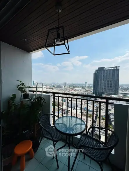Charming balcony with city view, perfect for relaxation and enjoying the skyline.