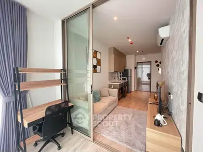 Modern living room with open layout, stylish furniture, and natural light in a contemporary apartment.
