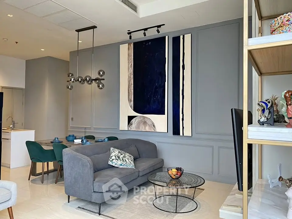 Modern living room with stylish decor and open kitchen layout