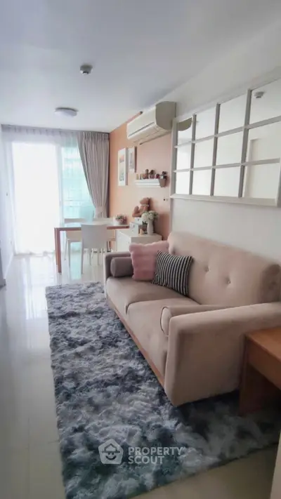 Chic living room with plush sofa and stylish decor in modern apartment