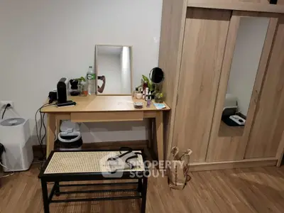 Cozy bedroom with wooden wardrobe and stylish vanity table