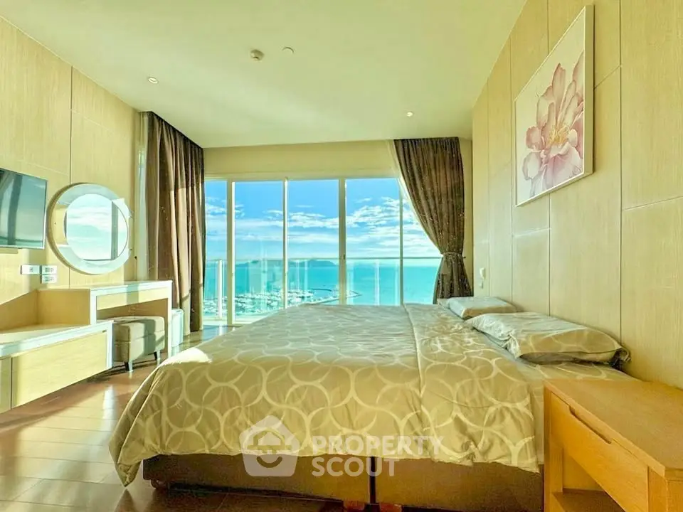 Luxurious bedroom with stunning ocean view and elegant decor