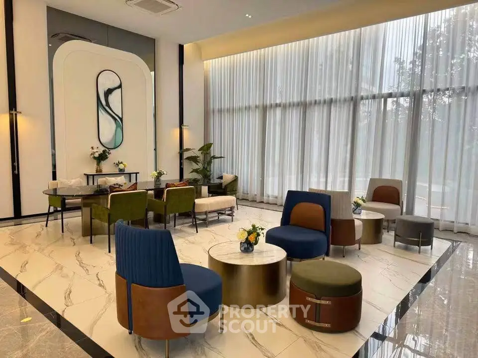 Luxurious modern living room with elegant furniture and floor-to-ceiling windows
