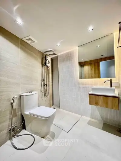Modern bathroom with sleek fixtures and contemporary design.