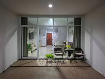 Charming modern living room with open layout and cozy seating area, perfect for relaxation.