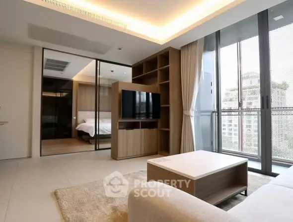 Modern living room with open layout and city view balcony in luxury apartment.