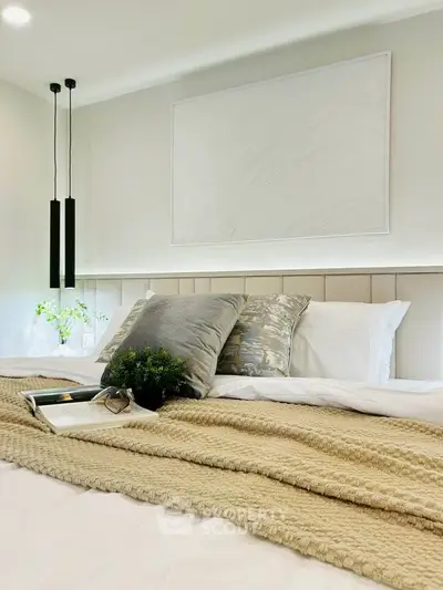 Luxurious bedroom with elegant decor and cozy bedding