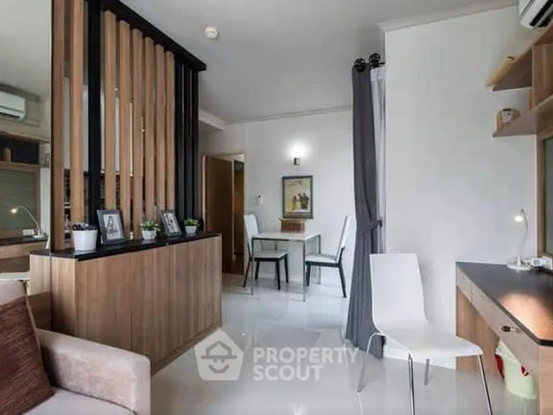 Modern living room with stylish partition and elegant decor