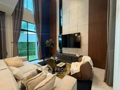 Luxurious modern living room with high ceilings and elegant decor