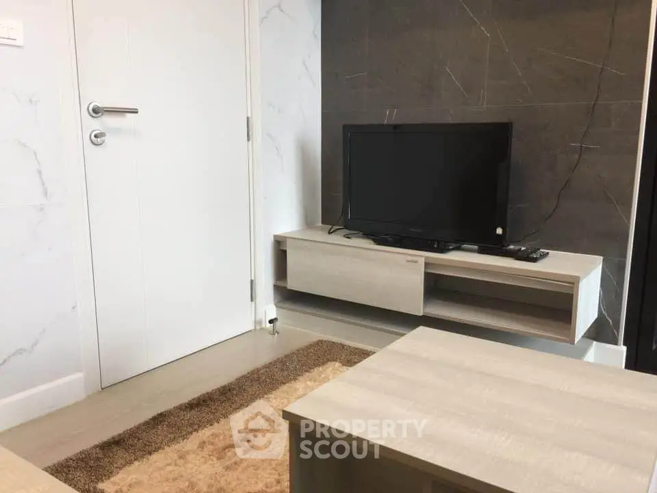 Modern living room with sleek TV stand and minimalist decor