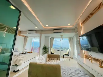 Luxurious living room with stunning view and modern decor in high-rise apartment