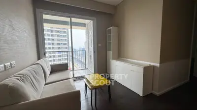 Modern living room with balcony view in urban apartment