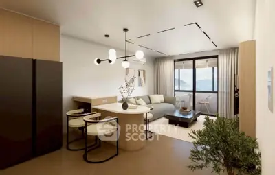 Modern living room with stylish decor and large windows offering scenic views.