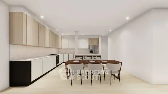 Spacious modern kitchen with sleek cabinetry and dining area