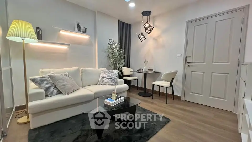 Modern living room with cozy seating and stylish decor