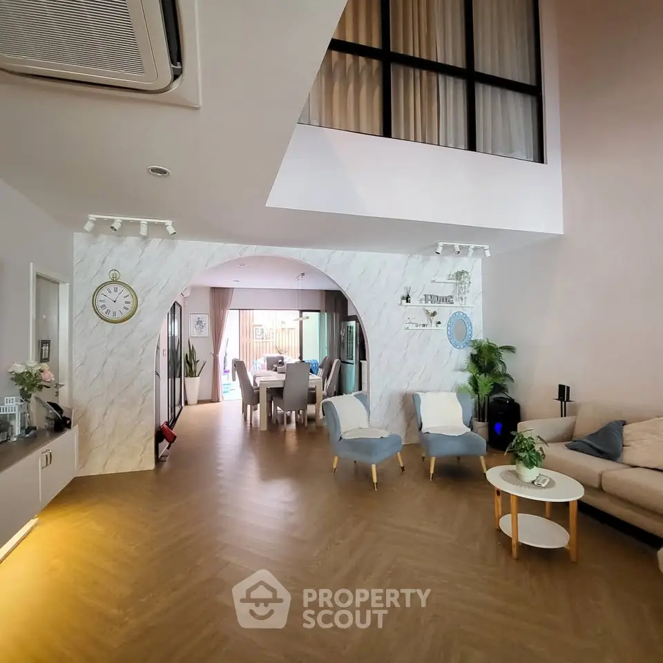 Spacious modern living room with elegant decor and open layout