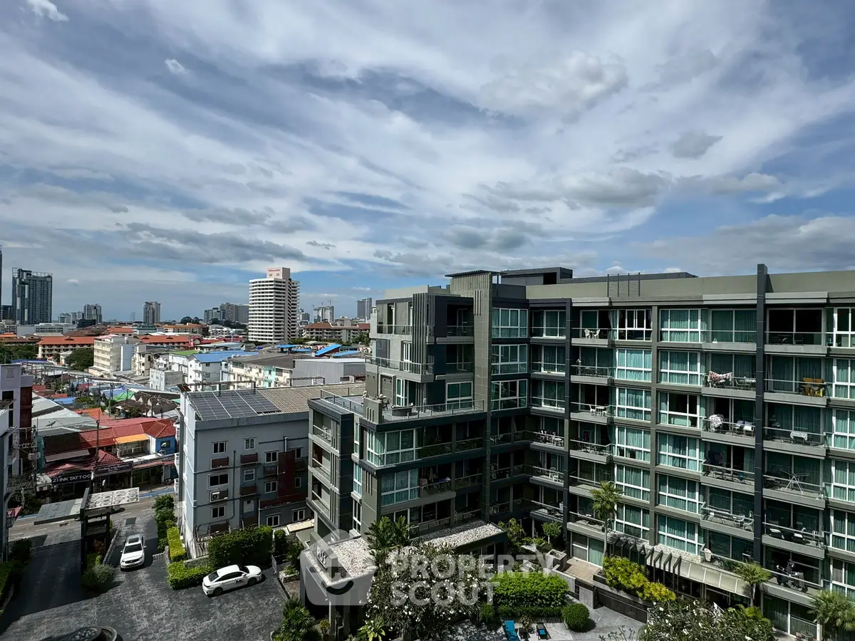 Stunning cityscape view from modern apartment building balcony