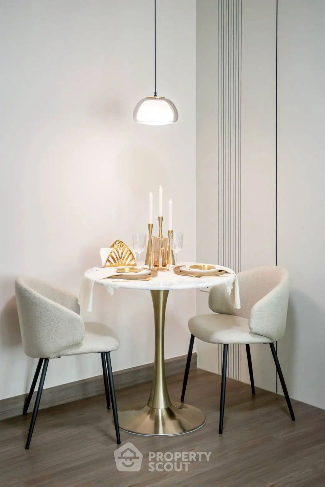 Elegant dining nook with modern table and chairs, perfect for intimate meals.