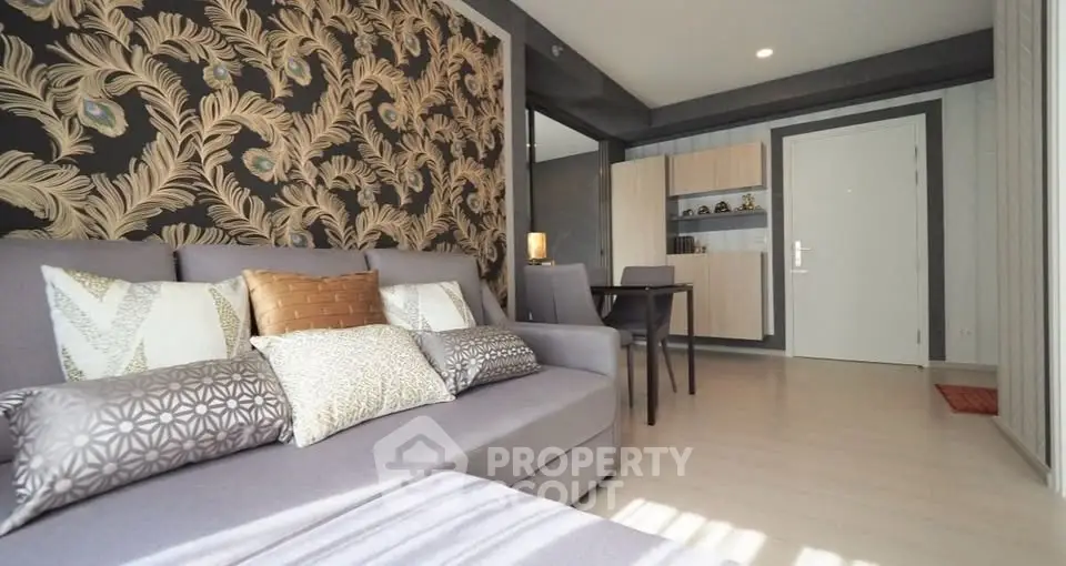 Stylish living room with elegant wallpaper and cozy seating area